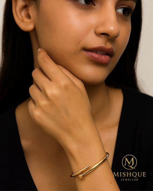 Golden Nail Twist Bangle